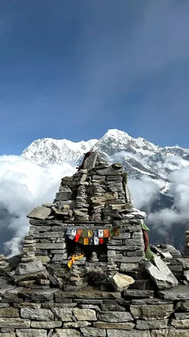 A stone shrine below the peaks